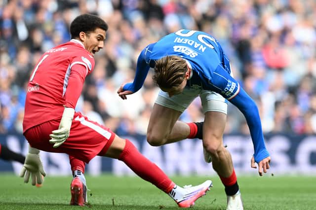 Motherwell goalkeeper Alex Paulsen was dispossessed by Rangers' Ryan Naderi for the only goal of the game.