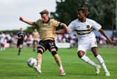 Dumbarton's Ali Omar (right) scored from inside his own half on Saturday.