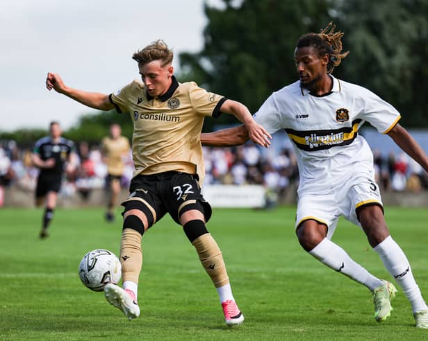 Dumbarton's Ali Omar (right) scored from inside his own half on Saturday.