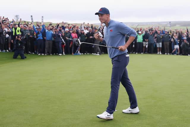 Englishman Josh Hill celebrates holing the winning putt in the 51st Walker Cup match on Sunday