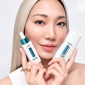 L'Oréal Paris Bright Reveal Niacinamide Dark Spot Set with serum and SPF 50+.
