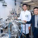 Prof. Jianhua Hao (right) and the research team fabricated ultra-thin heterostructure of 2D bismuth and indium selenide layers using pulsed laser deposition