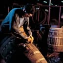 A Glenfiddich cooper hard at work. Picture: William Grant & Sons