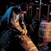 A Glenfiddich cooper hard at work. Picture: William Grant & Sons