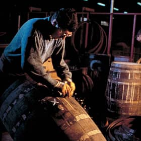 A Glenfiddich cooper hard at work. Picture: William Grant & Sons