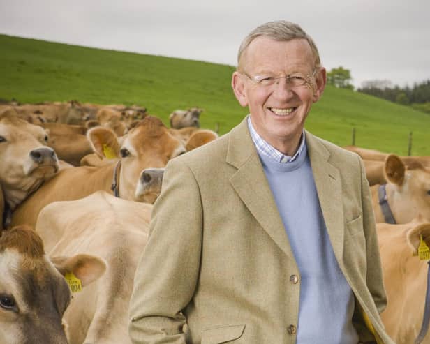 Dr Graham and his beloved Jersey cow herd.