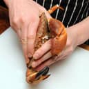 A brown crab is prepared. Picture: Lisa Ferguson