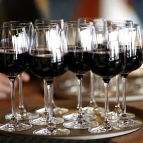 File photo dated 16/04/15 of a tray of glasses of red wine, as England's Chief Medical Officer has said that the idea that drinking a glass of red wine a day is good for you is an "old wives' tale". PRESS ASSOCIATION Photo. Issue date: Friday January 8, 2016. Dame Sally Davies defended a move to issue new guidance on drinking, saying there was a need to update the advice based on new scientific evidence. See PA story HEALTH Alcohol. Photo credit should read: Paul Harding/PA Wire