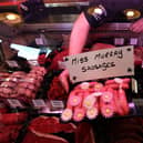 Butcher Connor Wilson from David Bennett and Son with his "Miss Murray Sausages"  in Andy Murray's home town of Dunblane. Picture: PA
