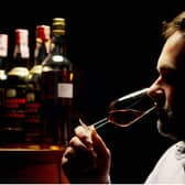Photographer- PHIL WILKINSON

SOS BUISNESS

PIC SHOWS , DAVID ROBERTSON - WHISKY TRADER , DIRECTOR OF THE WHISKY TRADING COMPANY INC.

PIC SHOWS HIM WITH SOME OF HIS SELECTION OF RARE AND OLD WHISKY'S , WITH A SAMPLE GLASS.