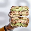 The C3PO (chipotle chicken club with smashed avo, maple bacon & @ayepickled dill pickles) served on a lightly toasted Montreal style bagel. (Picture: Bross Bagels)