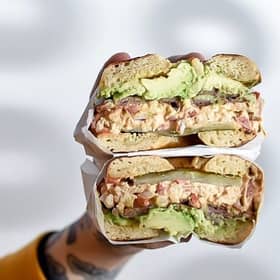 The C3PO (chipotle chicken club with smashed avo, maple bacon & @ayepickled dill pickles) served on a lightly toasted Montreal style bagel. (Picture: Bross Bagels)