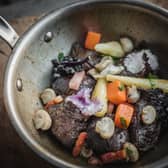 Red wine braised Clash Farm pork cheeks served with celeriac, lardons. Picture: Marc Millar