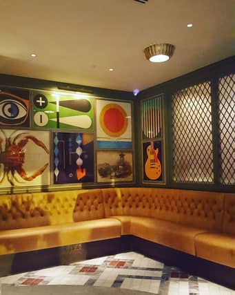 Picture: upstairs seating in The Ivy on the Square, Rosalind Erskine