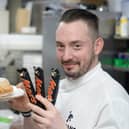 Fraser Walker, said the idea behind the deep fried Mars Bar calzone came from a simple conversation with the head chef (Picture: SWNS)