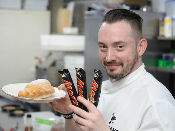 Fraser Walker, said the idea behind the deep fried Mars Bar calzone came from a simple conversation with the head chef (Picture: SWNS)
