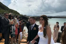 Stephanie Harkins, 33, and husband Stuart, 33, at their wedding..An Irn Bru obsessed bride received her perfect wedding gift when her new husband gave her a hamper full of the original recipe soft drink at their ceremony on the Isle of Eriskay, Outer Hebrides. See SWNS story SWSCdrink. A bride obsessed with Irn Bru was delighted when her new husband gave her a hamper full of the original recipe drink - as a wedding gift. Stephanie Harkins, 33, wed Stuart, 35, last week on the Isle of Eriskay, Outer Hebrides. Stephanie, a primary school teacher, had saved three cans of the original recipe Irn Bru in the lead up to the big day to relieve her pre-wedding stress.  But she was delighted when hubby Stuart surprised her with the ultimate wedding gift - 24 cans of Scotland's national drink.