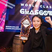 Handout photo supplied by World Class showing Bannie Kang and her trophy for being crowned world bartender of the year in Scotland on Thursday night.  PRESS ASSOCIATION Photo. Picture date: Friday September 27, 2019. See PA story SOCIAL Cocktail. Photo credit should read: World Class/PA Wire