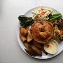 Leek, Onion & Comte Pie served with roasted Cabbage, Broccoli and chilli and Celeriac Slaw