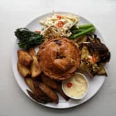 Leek, Onion & Comte Pie served with roasted Cabbage, Broccoli and chilli and Celeriac Slaw