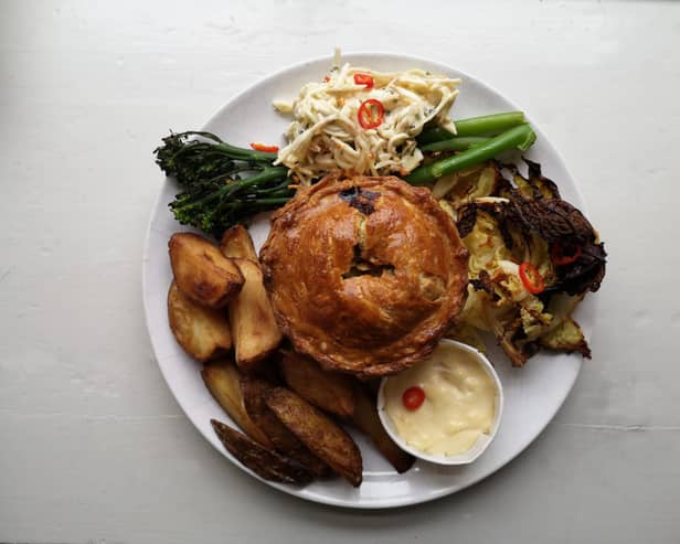 Leek, Onion & Comte Pie served with roasted Cabbage, Broccoli and chilli and Celeriac Slaw