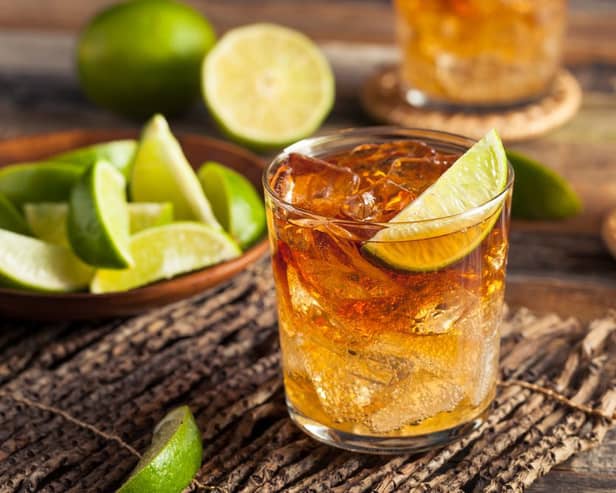 Dark,And,Stormy,Rum,Cocktail,With,Lime,And,Ginger,Beer