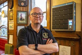 Kevin McGhee with the key safe box at the Athletic Arms