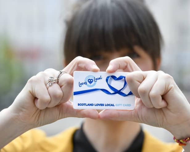 Natalie Farrell, Co-Director of The Guild, Dumfries, and proprietor of Natalie Farrell Handmade, promoting the new Scotland Loves Local Gift Card in Dumfries town centre. The card is being rolled out across all of the country's 32 local authority areas as part of the Scotland Loves Local campaign in 2021, spearheaded by Scotland's Towns Partnership (STP), with the support of the Scottish Government and working with Perth-based fintech Miconex. Picture only for use in connection with promoting the Scotland Loves Local Gift Card.:
Stuart Walker Photography 2021