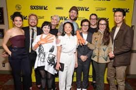 AUSTIN, TEXAS - MARCH 11: (L-R) Jenny Slate, Daniel Kwan, Tallie Mendel, Jamie Lee Curtis, Daniel Scheinert, Stephanie Hsu, Ke Huy Quan, Jonathan Wang, Michelle Yeoh and Harry Shum Jr. attend the opening night premiere of "Everything Everywhere All At Once" during the 2022 SXSW Conference and Festivals at The Paramount Theatre on March 11, 2022 in Austin, Texas. (Photo by Rich Fury/Getty Images for SXSW)