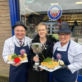 Paul Boyle and his daughter Mariesha Boyle with Rosalind and the supreme champion trophy