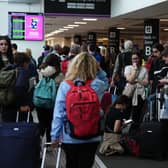 Passengers at Edinburgh Airport as widespread IT outages affecting airlines caused long queues at airports