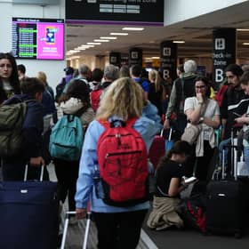 Passengers at Edinburgh Airport as widespread IT outages affecting airlines caused long queues at airports