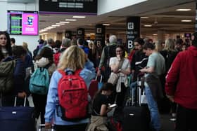 Passengers at Edinburgh Airport as widespread IT outages affecting airlines caused long queues at airports