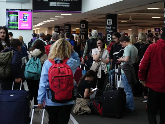 Passengers at Edinburgh Airport as widespread IT outages affecting airlines caused long queues at airports