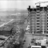 Modern housing under construction beside old tenements in the Gorbals area of Glasgow, c. 1960