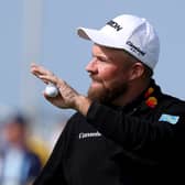 Home hero Shane Lowry of acknowledges the crowd on the 18th green after carding a course-record 62 on day two of the Amgen Irish Open at Trump International Golf Links in Doonbeg