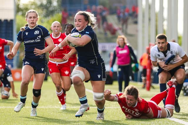 Scotland's Evie Gallagher breaks clear to set up a try for Shona Campbell, left, during the WXV Global Series match against Canada at Hive Stadium. Canada won 64-26.