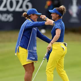 Team Europe’s Nastasia Nadaud celebrates her Solheim Cup singles victory on Sunday with Scottish caddie Michele Thomson at Bernardus Golf in Cromvoirt, Netherlands