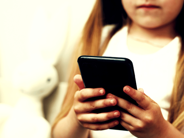 Parents are being encouraged to discuss online safety risks with children before giving them greater independence on a smartphone.