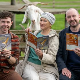 Storytellers David Hughes, Ruth Kirkpatrick and Festival Director Daniel Abercrombie with a goat. Pic: Neil Hanna.