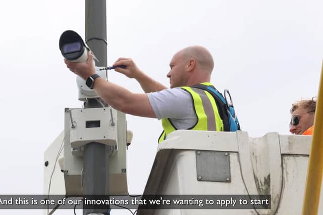 A LitterCam being installed