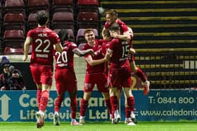 Aberdeen's Connor Ronan celebrates scoring to make it 2-0 with teammates during a William Hill Premiership match between Motherwell and Aberdeen at Fir Park
