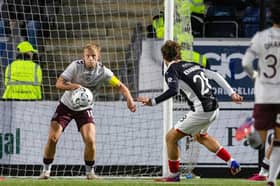  Falkirk's Ben Krauhaus scores to make it 1-0 during a William Hill Premiership match between Falkirk and Heart of Midlothian
