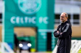 Celtic manager Martin O'Neill oversees training.