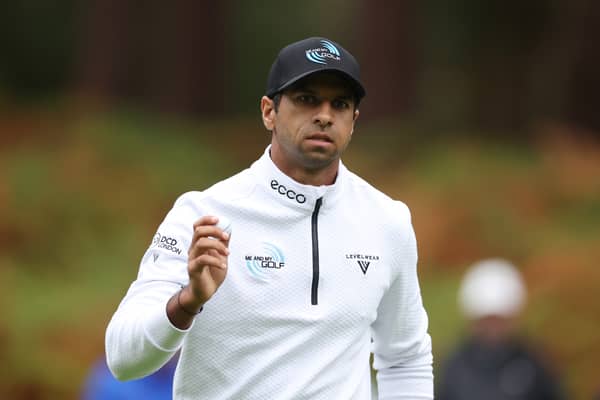Aaron Rai acknowledges the crowd following a birdie on the 11th green on day one of the BMW PGA Championship at Wentworth Golf Club 