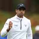 Aaron Rai acknowledges the crowd following a birdie on the 11th green on day one of the BMW PGA Championship at Wentworth Golf Club 