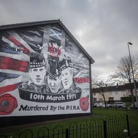 A mural depicting three Royal Highland Fusiliers, brothers John and Joseph McCaig from Ayr and Dougald McCaughey from Glasgow, who were shot dead by the Provisional IRA in North Belfast in 1971, on a gable wall in Newtownabbey, Northern Ireland (Picture: Liam McBurney)