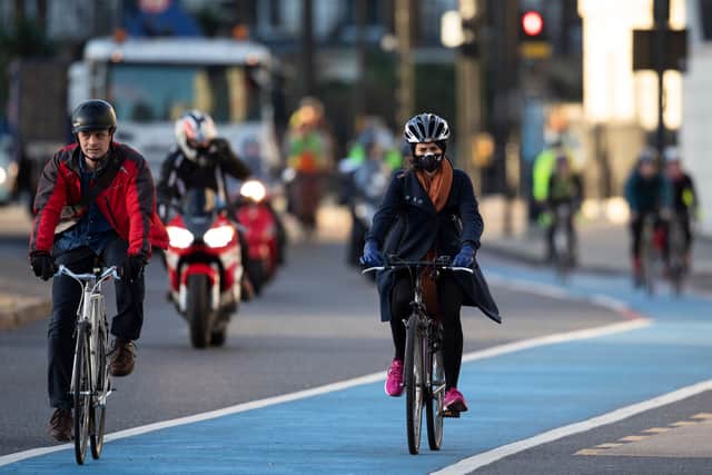 A cyclist riding with a mask in London