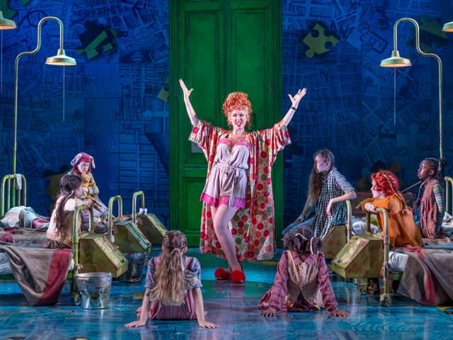 Clare Sweeney as the villainous orphanage superintendent Miss Hannigan in Annie