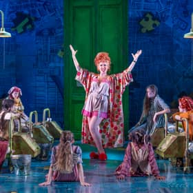 Clare Sweeney as the villainous orphanage superintendent Miss Hannigan in Annie